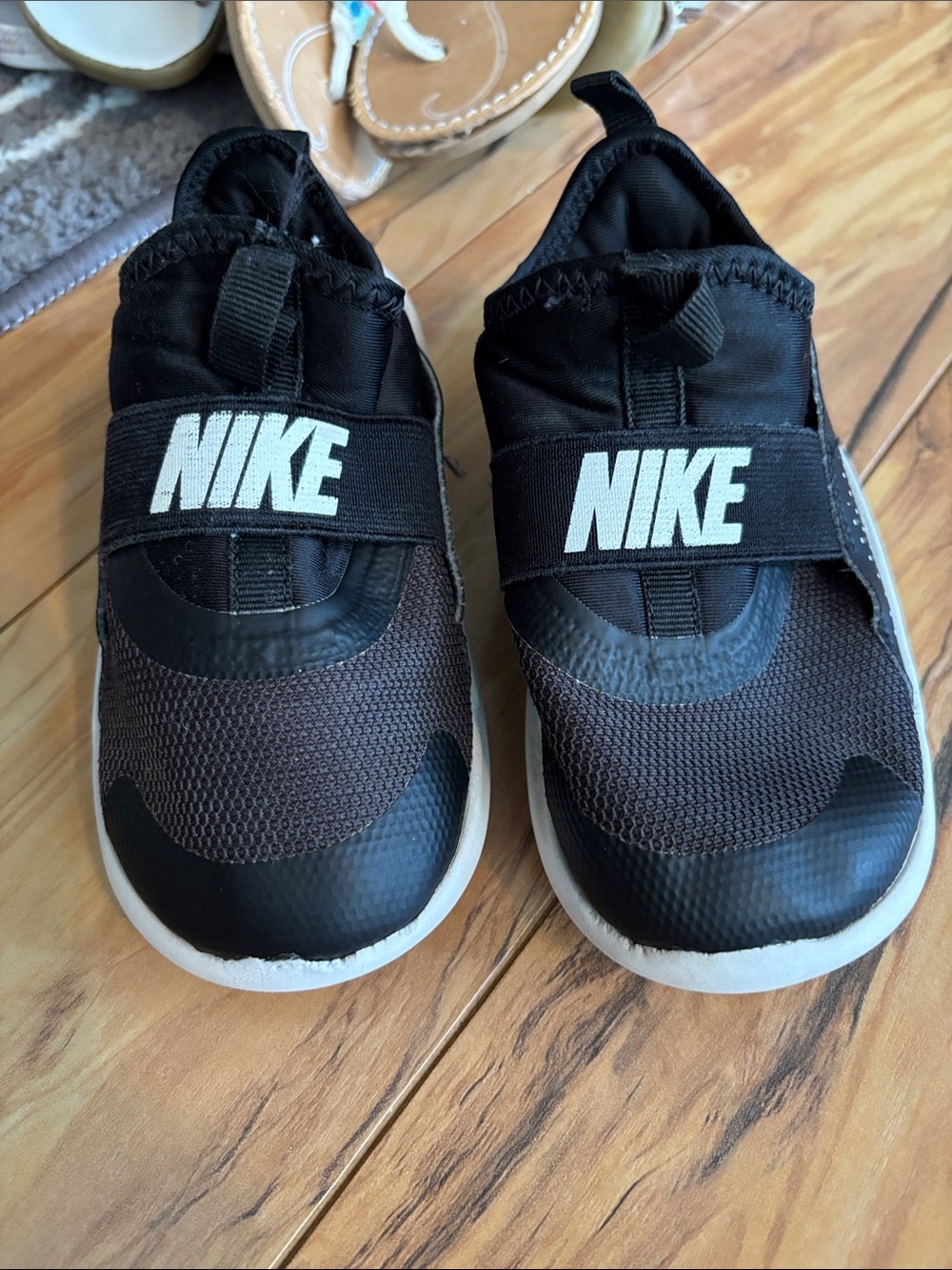 Nike Black and White Slip On Athletic Shoes